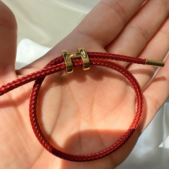 Adjustable wire bracket 
Red and Gold Braided Bracelet - Picture 6 of 10